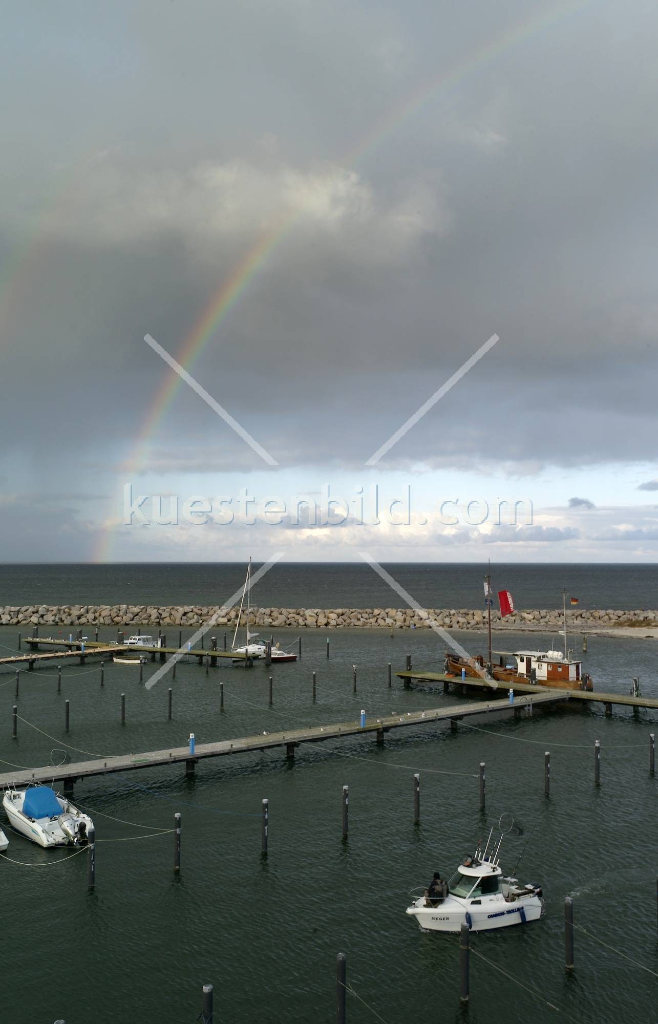 Glowe, Heimkehr unterm Regenbogen