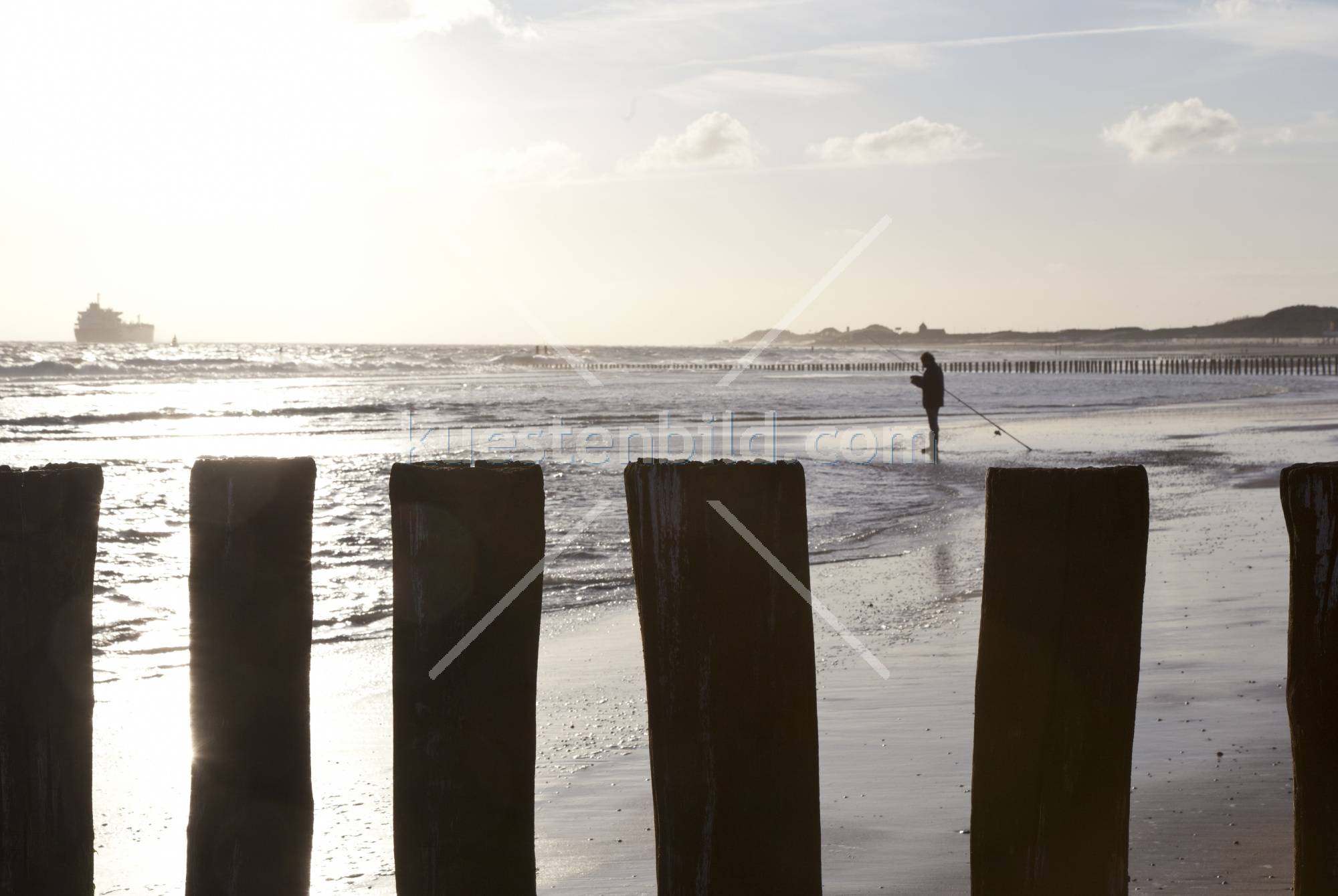 Angler am Strand