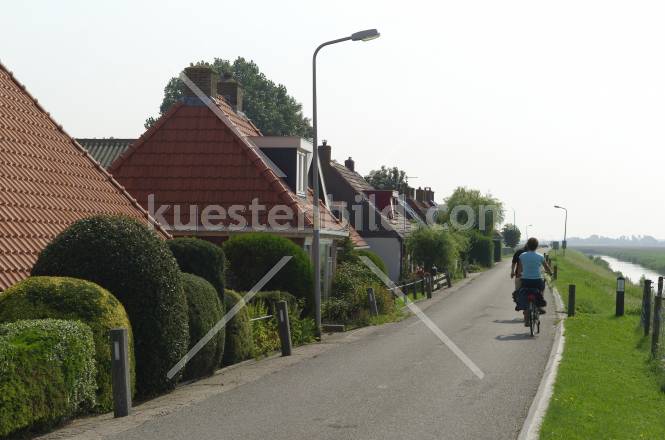 Radfahrer auf dem Deich