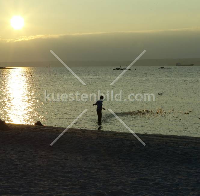 Glücksburg, Junge im Abendlicht
